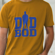 Yellow dad t-shirt with blue 'DAD BOD' graphic on a blurred background