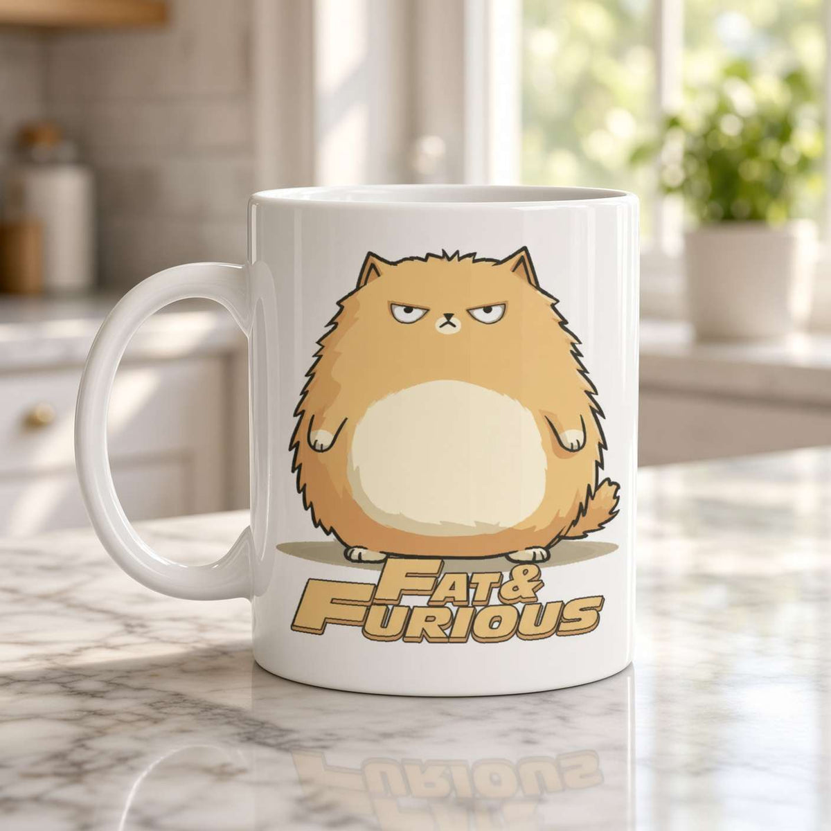 A white ceramic mug featuring a cartoon illustration of a fluffy orange cat with the text 'Fat & Furious' printed below it, set on a marble countertop in a bright kitchen.