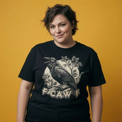 Woman smiling while wearing a black FCAWF t-shirt, funny ladies rude swearing crow design that every no-nonsense lady will claim