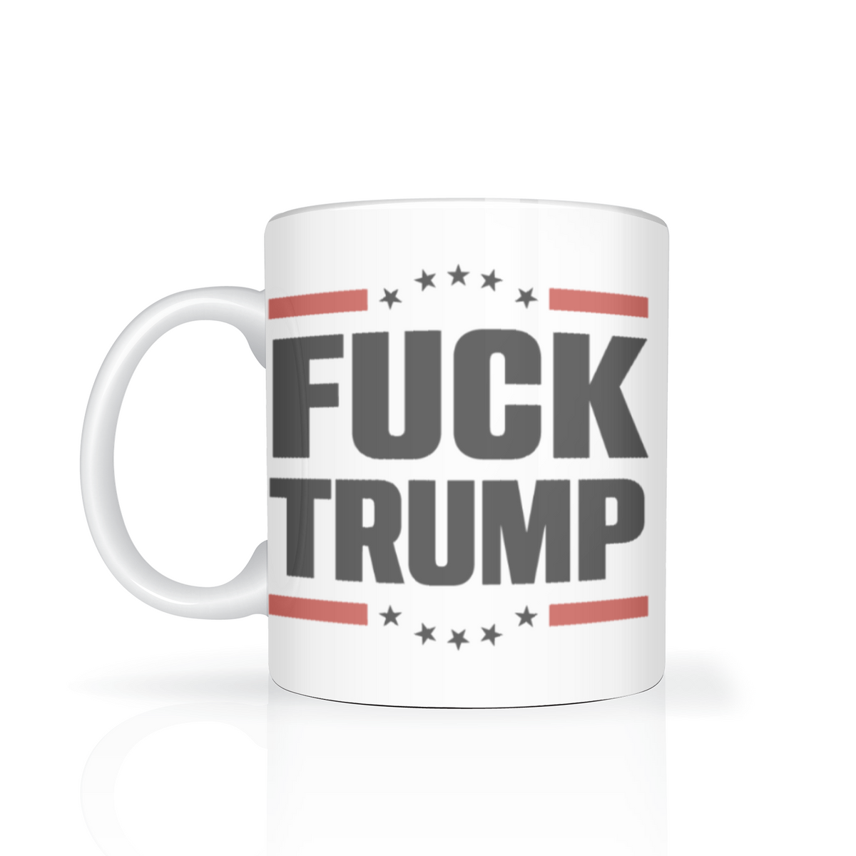 A white ceramic mug on a bright background reads “FUCK TRUMP” in bold gray lettering, framed by red stripes and black stars; its tone is defiant and political.