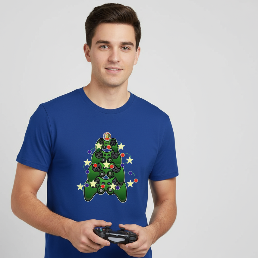 Man wearing a blue t-shirt with a green character design, holding a gaming controller on a light gray background