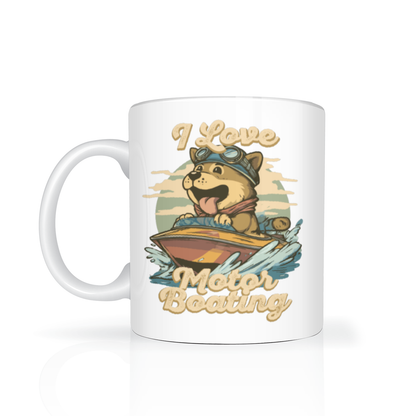 White ceramic mug with a playful cartoon dog in goggles driving a speedboat through splashing water, beneath the words “I Love Motor Boating”; cheerful vintage-style design.