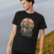 Man wearing a black England T-shirt featuring roaring lions in front of a red cross. The text 