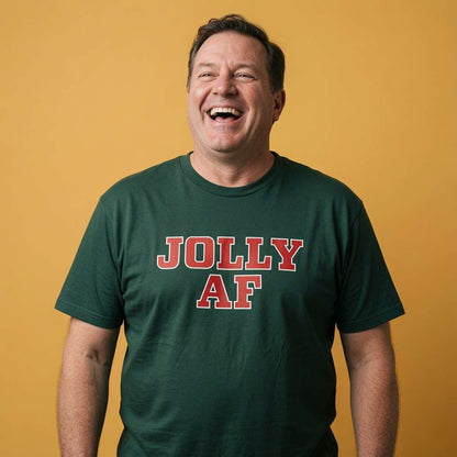 Man laughing with head tilted back while wearing a green Jolly AF t-shirt, funny mens witty slogan shirt that every cheeky lad will claim