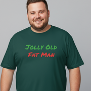 Man wearing a green funny Christmas t-shirt with 'Jolly Old Fat Man' text on a gray background
