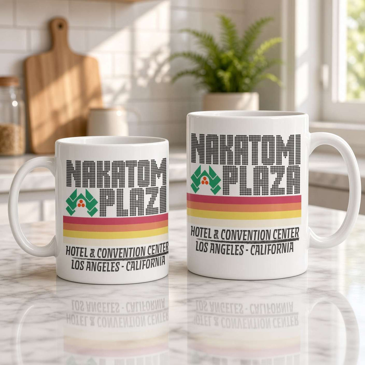 Two white Narcatomi Plaza mugs of different sizes sit on a sunlit marble counter, with retro hotel lettering and colorful stripes; a calm, warm kitchen scene.