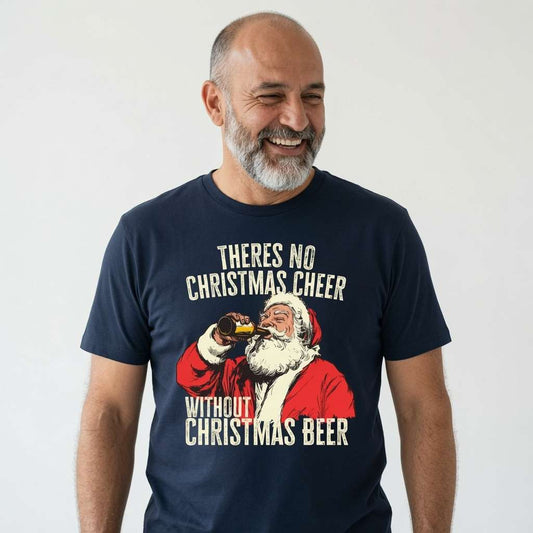 Bald man with a full grey beard laughing while wearing a navy t-shirt of Santa chugging a beer, witty festive pub banter slogan “There’s No Christmas Cheer Without Christmas Beer”