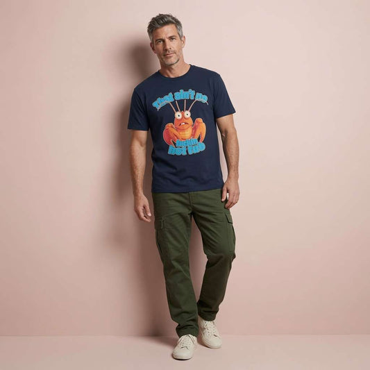 Man standing casually in a navy t-shirt featuring an angry cartoon lobster and the slogan “That ain’t no fuckin hot tub”, funny and slightly offensive animal pun design
