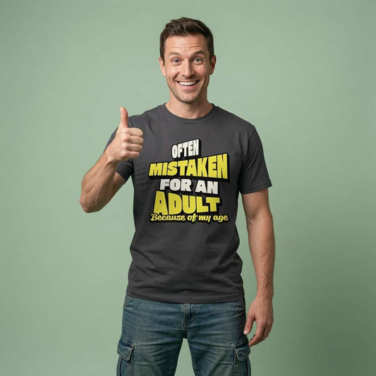 Man smiling and giving a thumbs-up in a black Often Mistaken For An Adult Because Of My Age t-shirt, funny adult slogan that every dad will claim is true