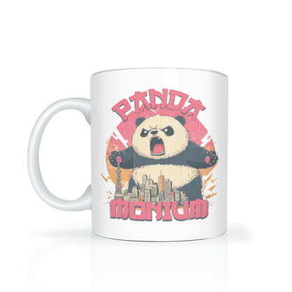 A white ceramic mug featuring a graphic print of an angry panda with the text 'PANDA MONUM' in pink, set against a clean white background with a soft reflection.