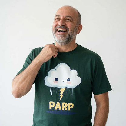Bald man laughing with one hand on his collar in a dark green Parp t-shirt, witty and cheeky kawaii thunder graphic that doesn’t take itself seriously