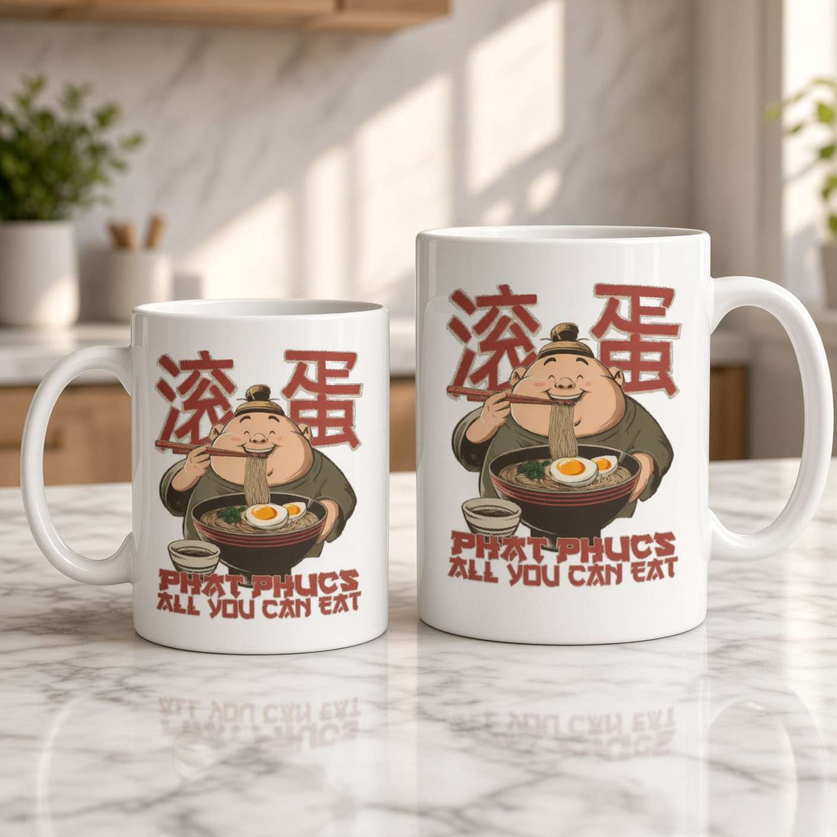 Two white ceramic mugs, one smaller and one larger, display a smiling cartoon character eating noodles, red lettering, and Chinese characters. They sit on a sunlit marble kitchen counter, creating a warm, playful mood.