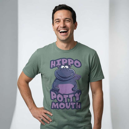 Man laughing with one hand on his hip while wearing a stone green Hippo Potty Mouth t-shirt, fun and rude offensive mens hippo graphic full of pure attitude