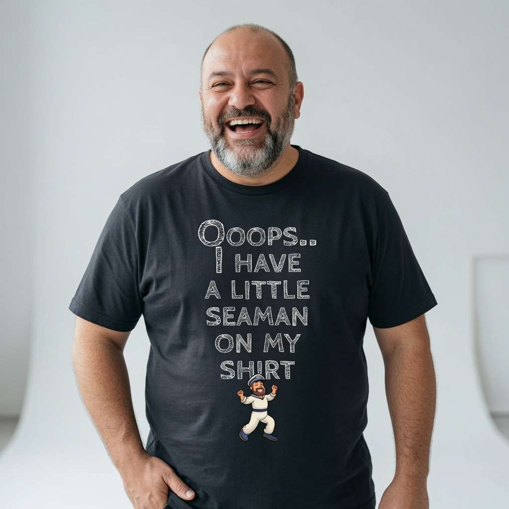 Bald bearded man laughing in a black Ooops.. I Have a Little Seaman on My Shirt t-shirt, funny and cheeky mens offensive sailor graphic that every dirty-minded lad will claim