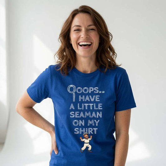 Woman laughing with one hand on her hip in a blue Ooops.. I Have a Little Seaman on My Shirt t-shirt, funny and cheeky rude slogan that every dirty-minded lady will claim