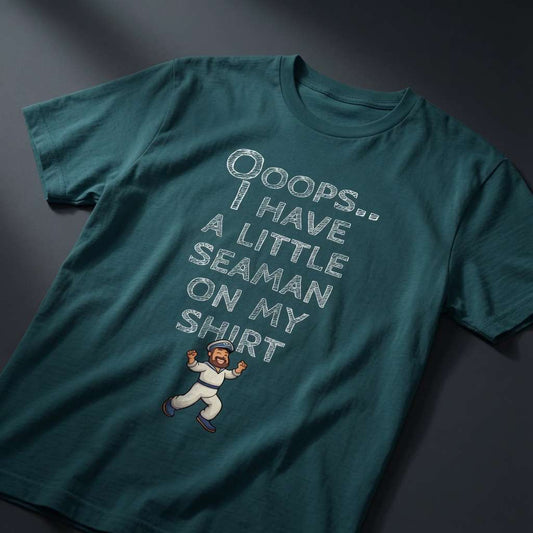 Teal green Ooops.. I Have a Little Seaman on My Shirt t-shirt laid flat showing the full text and tiny cartoon sailor, funny and cheeky offensive sailor ladies design