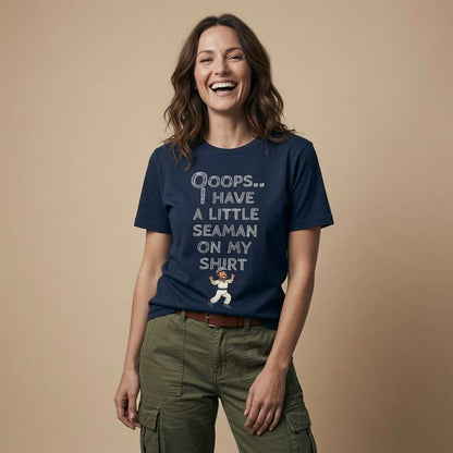 Woman laughing while wearing a navy Ooops.. I Have a Little Seaman on My Shirt t-shirt with the mini sailor graphic, rude ladies sailor fun slogan full of pure attitude