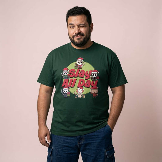 Bearded man winking while wearing a glazed green Slay All Day t-shirt featuring cute horror icons in Santa hats, mens alternative Christmas design
