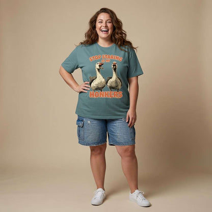 Woman laughing with one hand on her hip in a green bay Stop Staring at My Honkers t-shirt, funny and cheeky ladies animal graphic full of pure attitude