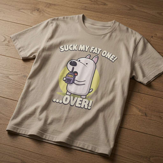 Stone Suck My Fat One! …Over! t-shirt laid flat on a wooden surface showing the full cartoon dog graphic, cheeky and fun mens rude dog design that every cheeky lad will claim
