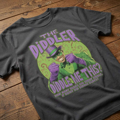Khaki The Diddler t-shirt laid flat on a wooden surface showing the full Riddler parody graphic and “Diddle Me This?” slogan, funny offensive meme design that every cheeky lad will claim