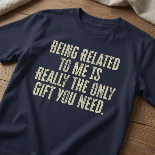 Woman laughing while wearing a blue Being Related To Me Is Really The Only Gift You Need t-shirt, witty ladies funny xmas wife gift design full of pure attitude