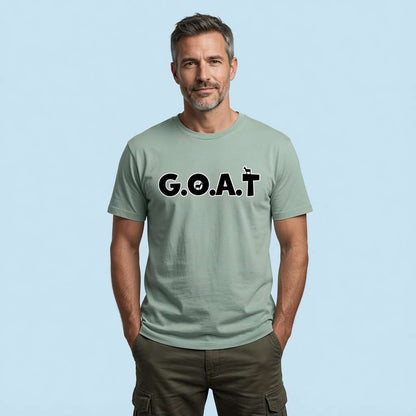 Man standing with hands in his pockets while wearing an aloe G.O.A.T t-shirt, legendary mens animal pun statement design full of pure attitude