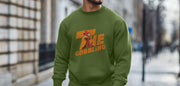 Man in a green Christmas Jumper with a turkey logo and the phrase 