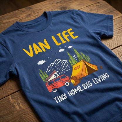 Blue Van Life Tiny Home Big Living t-shirt laid flat on a wooden surface showing the full camping scene graphic, mens camping site tent design gift shirt that every cheeky lad will claim