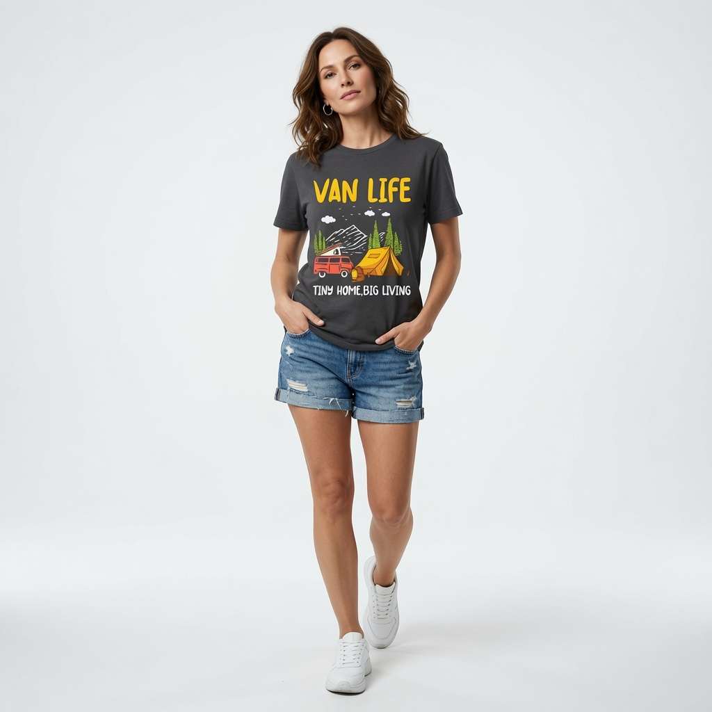 Woman standing with hands in her pockets while wearing a black Van Life Tiny Home Big Living t-shirt, cool camper van design tee full of pure attitude