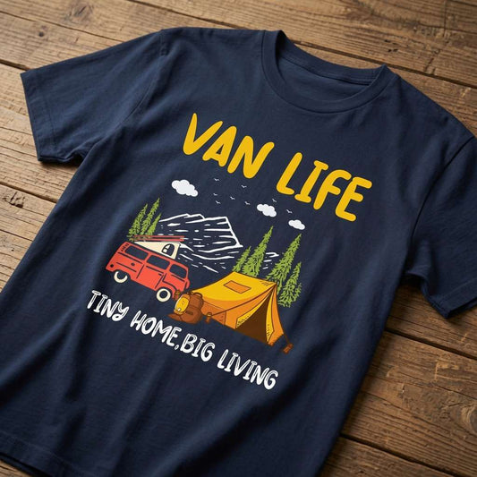 Navy Van Life Tiny Home Big Living t-shirt laid flat on a wooden surface showing the full camper van and tent graphic, cheeky camping van tent slogan design