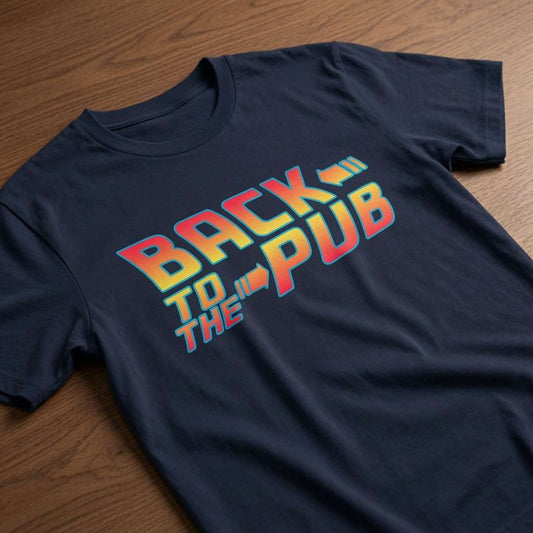 Navy Back to the Pub t-shirt laid flat on a wooden surface with the retro film-inspired logo, pub statement mens design
