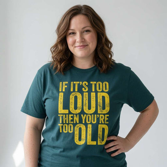 Woman standing with one hand on her hip while wearing a green If It’s Too Loud Then You’re Too Old t-shirt, funny cheeky petrolhead statement ladies shirt