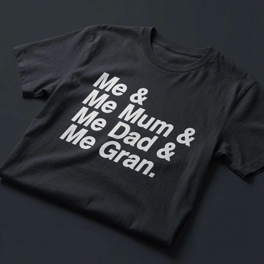 Black Me & Me Mum & Me Dad & Me Gran t-shirt laid flat showing the full white text slogan, fun and cheeky England football design full of pure attitude