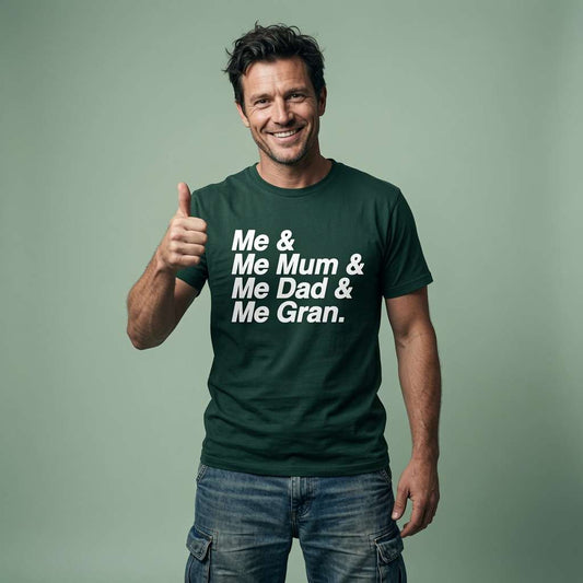 Man smiling and giving a thumbs-up in a green Me & Me Mum & Me Dad & Me Gran t-shirt, funny and relatable England football-inspired text shirt that every cheeky lad will claim