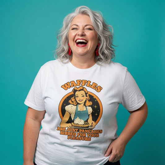 Woman laughing while wearing a white Waffles Are Just Pancakes Ribbed For Your Pleasure t-shirt, cheeky ladies rude retro waffle graphic design full of pure attitude