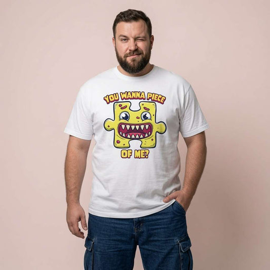Man winking with one hand in his pocket while wearing a white You Wanna Piece of Me? t-shirt featuring a cartoon puzzle piece monster, funny mens humorous puzzle pun design