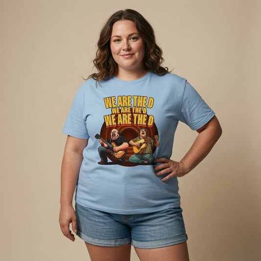 Woman standing with one hand on her hip in a light blue We Are The D t-shirt, unique artwork music-inspired design full of pure attitude
