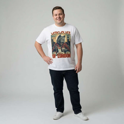 Man standing with one hand on his hip while wearing a white Werewolves of London t-shirt featuring a werewolf at a cafe table, music graphic design
