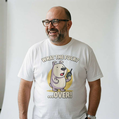 Man laughing with one hand in his pocket in a white What the Fuck? …Over! t-shirt, cute rude phonetic puppy mens shirt that every cheeky lad will claim