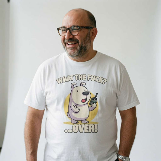 Man laughing with one hand in his pocket in a white What the Fuck? …Over! t-shirt, cute rude phonetic puppy mens shirt that every cheeky lad will claim