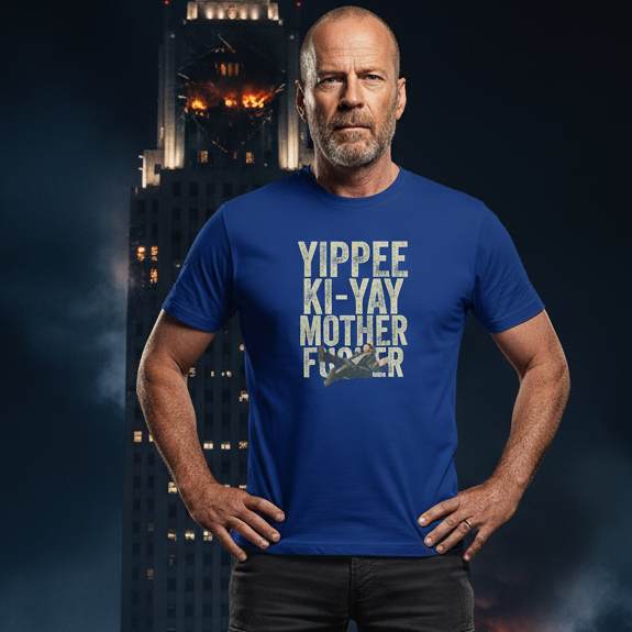 Bald man in a blue Christmas T-shirt with bold text "Yippee Ki-Yay Mother", stands with hands on hips. The Nakatomi Plaza on fire is in the background, creating a dramatic, intense scene, similar to a scene from Die Hard.