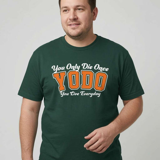 Man smiling slightly with one hand near his waist in a green YODO t-shirt, cheeky mens positive motivational quote shirt that every cheeky lad will claim