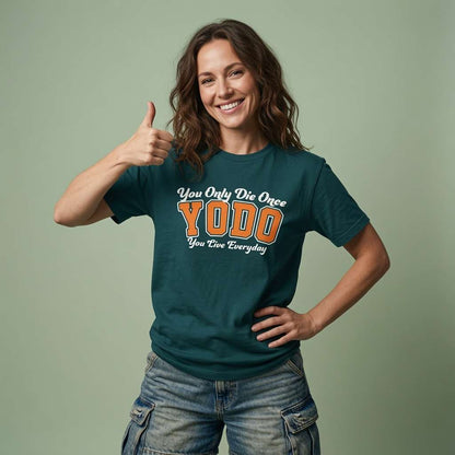 Woman smiling and giving a thumbs-up with one hand on her hip in a dark green YODO t-shirt, ladies funny positive motivational shirt full of pure attitude