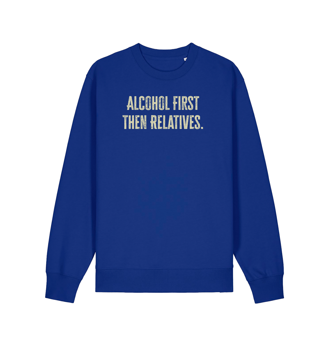blue christmas sweater with the slogan 'alcohol first then relatives'