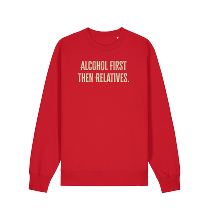 red christmas sweater with the slogan 'alcohol first then relatives'