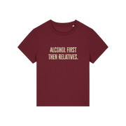 burgundy christmas t-shirt with the slogan 'alcohol first then relatives'