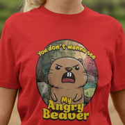 Red t-shirt with a funny cartoon angry beaver graphic and funny slogan, worn by a person.