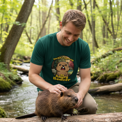 Man in a forest with a beaver on a log, wearing a green t-shirt with a beaver graphic.