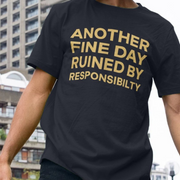 Person wearing a black funny slogan t-shirt with yellow text 